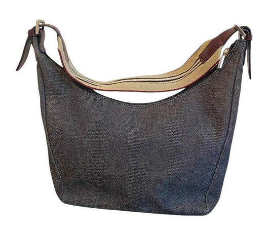 Burberry blue denim shoulder bag with leather trim and polished metal hardware.