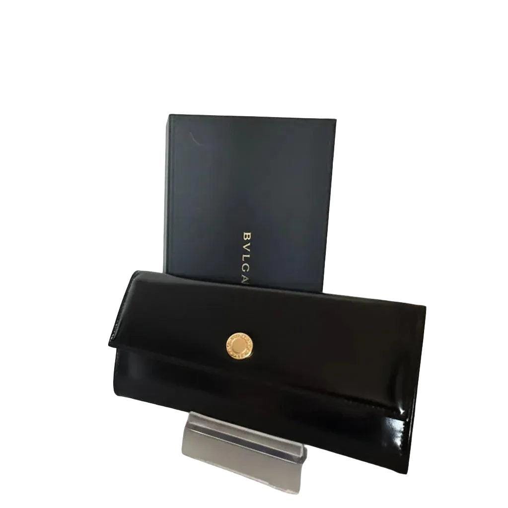 BVLGARI black patent long wallet with sleek design and premium leather craftsmanship.