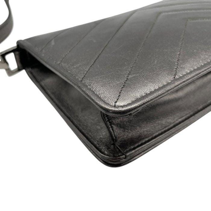 Yves Saint Laurent grey metallic shoulder bag with quilted design and silver tone hardware.