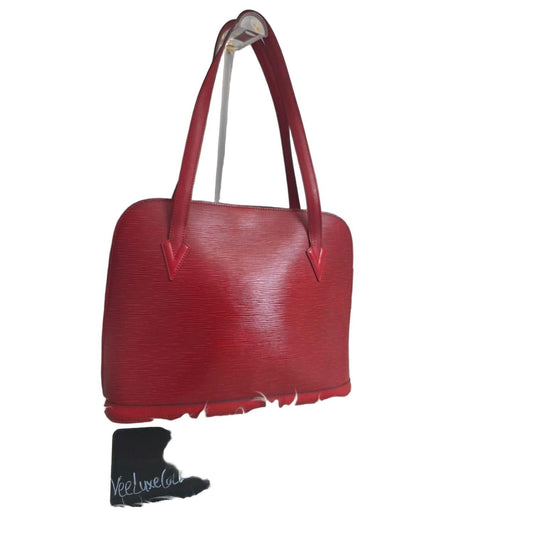 Louis Vuitton shoulder bag red Epi leather with gold tone hardware and vintage creases.