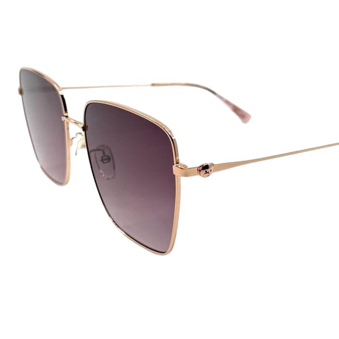 Moschino gold sunglasses with pink tinted lenses and iconic logo on temples.