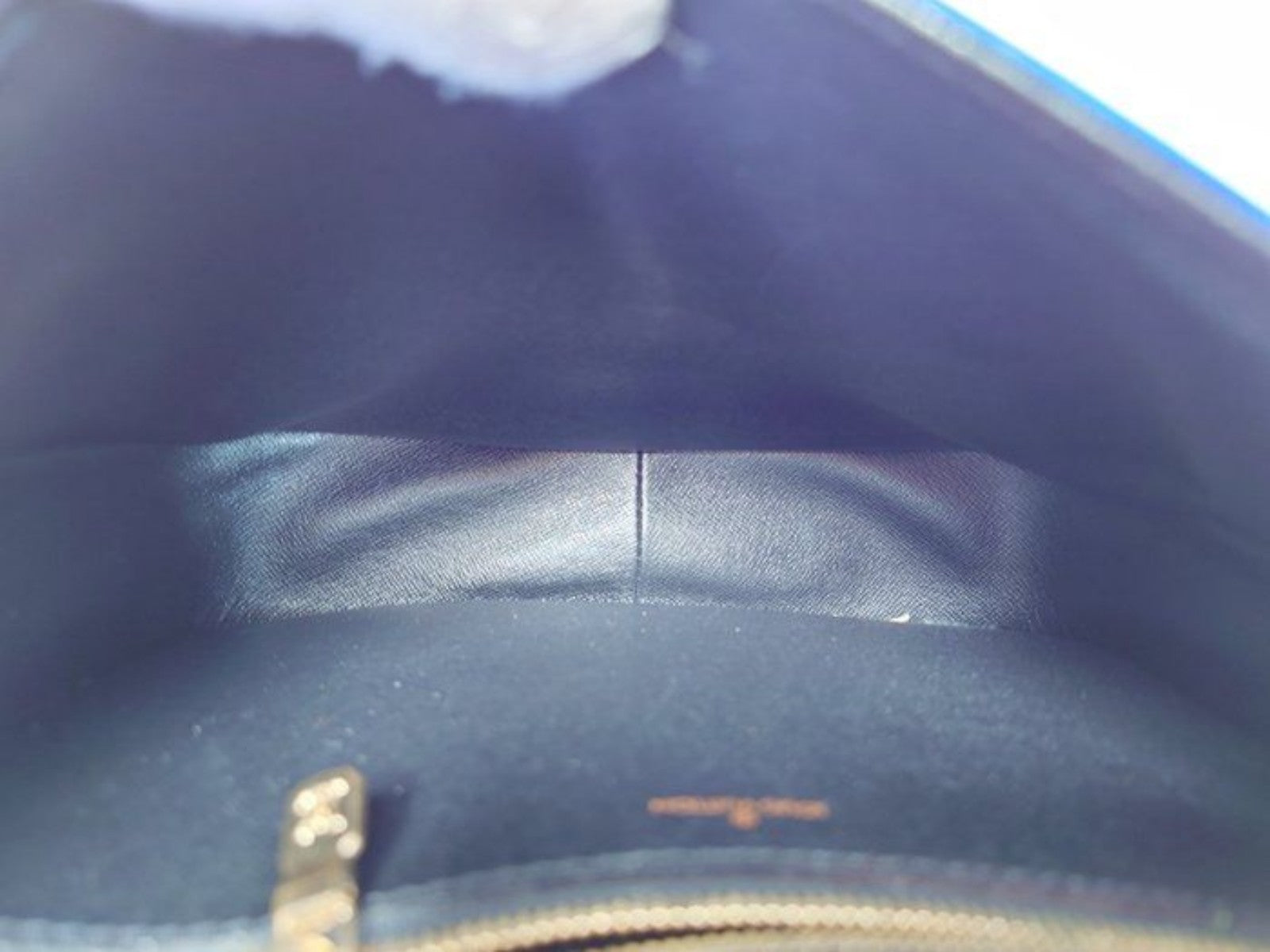 Louis Vuitton blue Epi leather crossbody bag with signature LV logo and brass hardware.