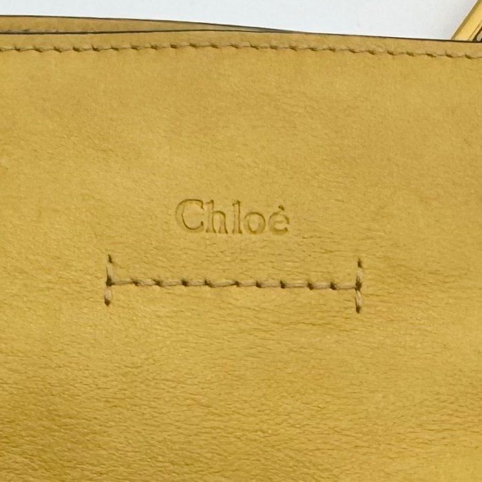 Chloè yellow suede and leather shoulder bag with gold-plated hardware and two-way design.