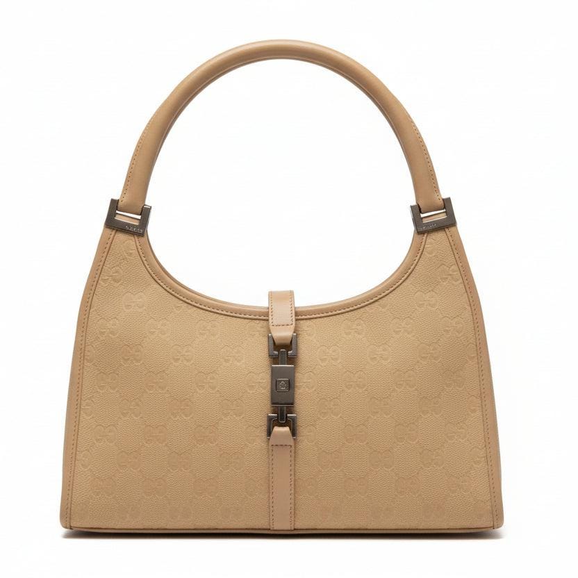 Gucci Jackie shoulder bag cream beige GG canvas with leather trim and silver hardware.