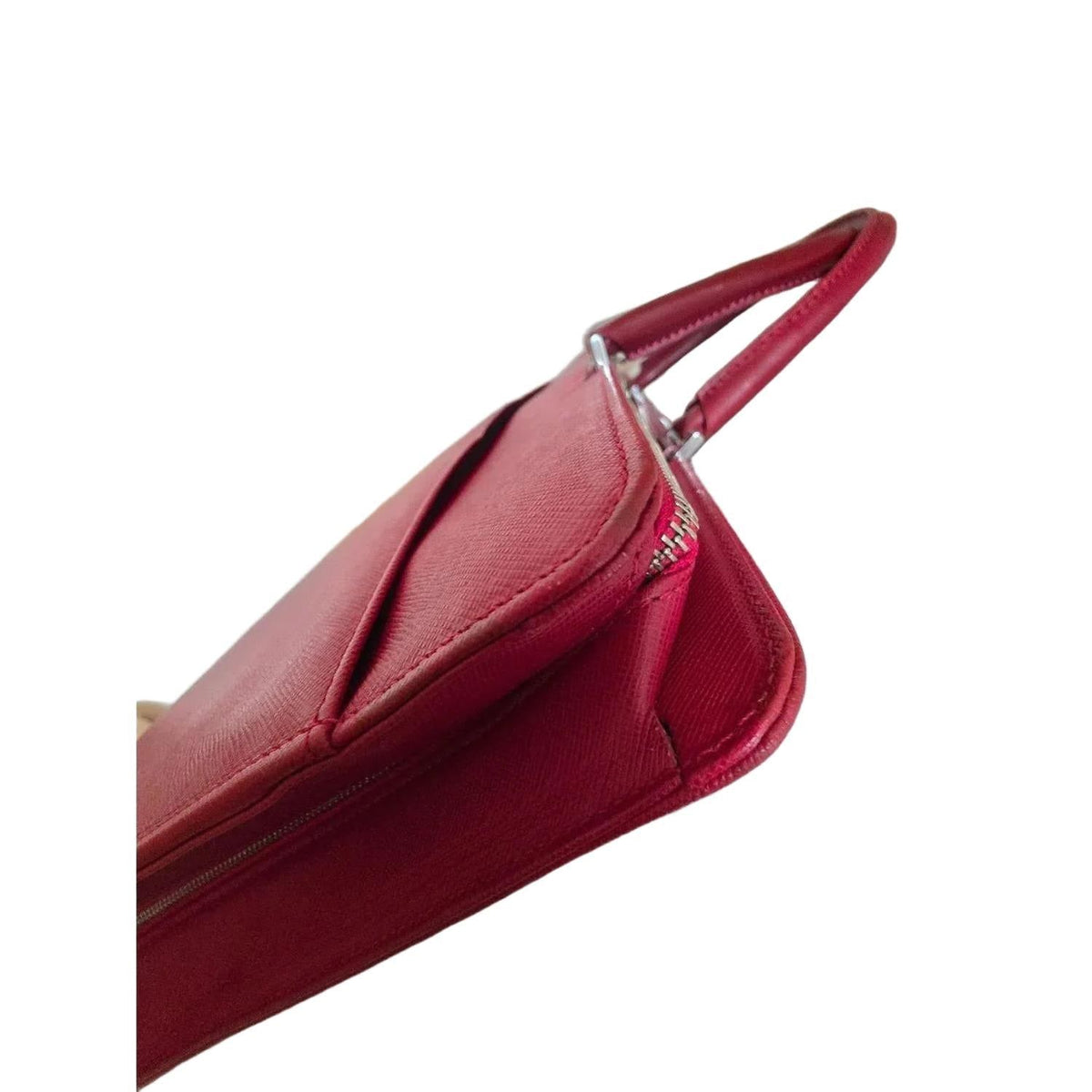 Burberry red business briefcase bag with signature logo plate and saffiano leather finish.