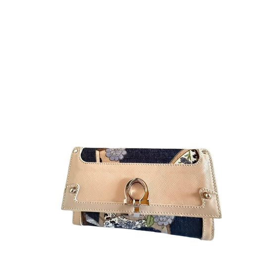 Salvatore Ferragamo burgundy wallet patent leather with iconic bow detail and signature bars.