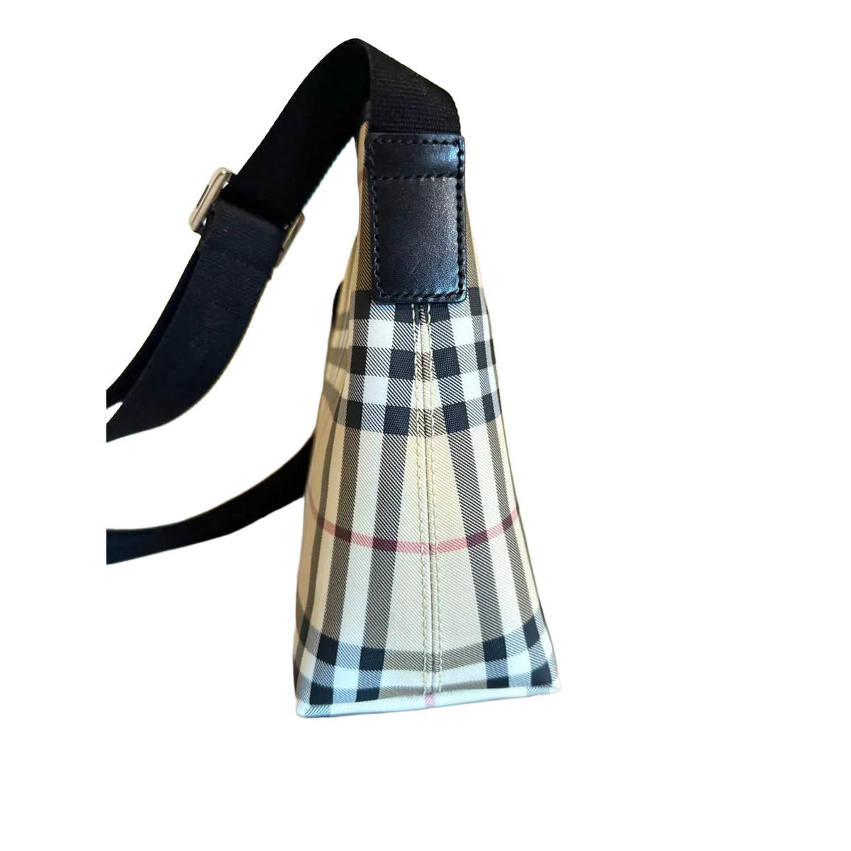 Burberry beige messenger bag with classic Nova Check pattern and silver-tone hardware.