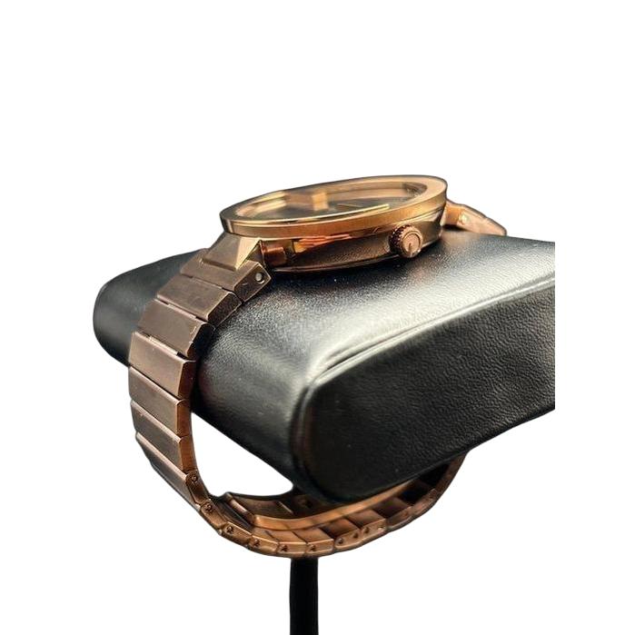 Gucci brown quartz watch with interlocking-G bezel and sunbrushed dial.