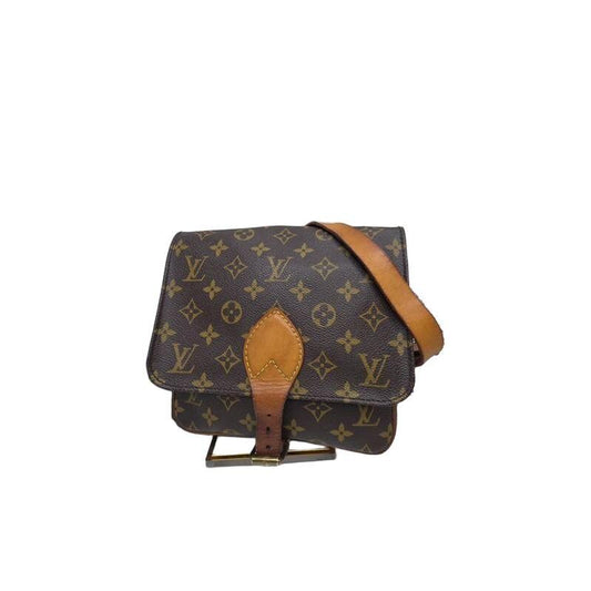 Louis Vuitton brown crossbody bag with iconic monogram canvas and aged leather trim.
