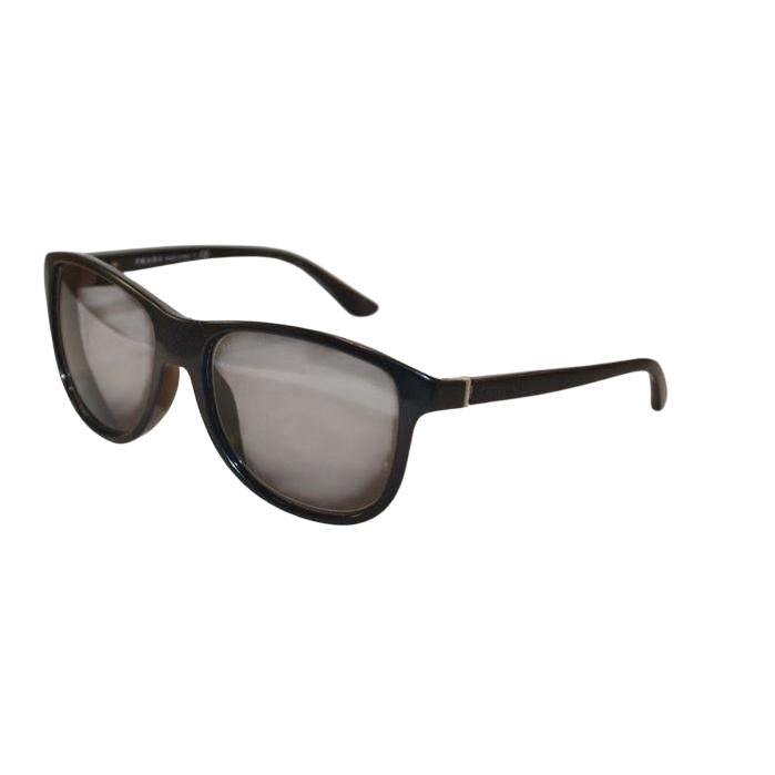 Prada black sunglasses with sleek frames, metal and plastic blend, minimalistic design.