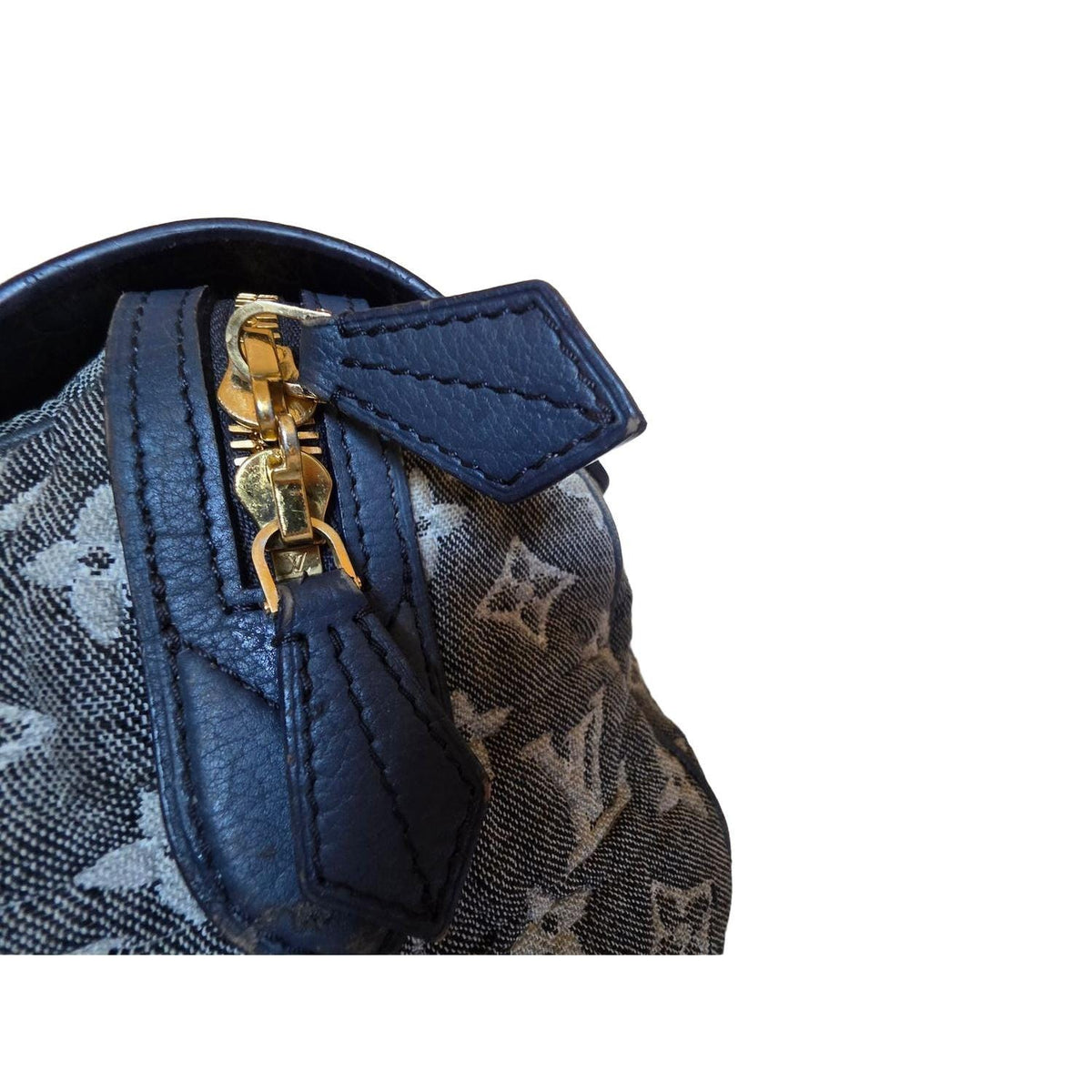Louis Vuitton gold and grey handbag with monogram canvas and gold-plated accents.