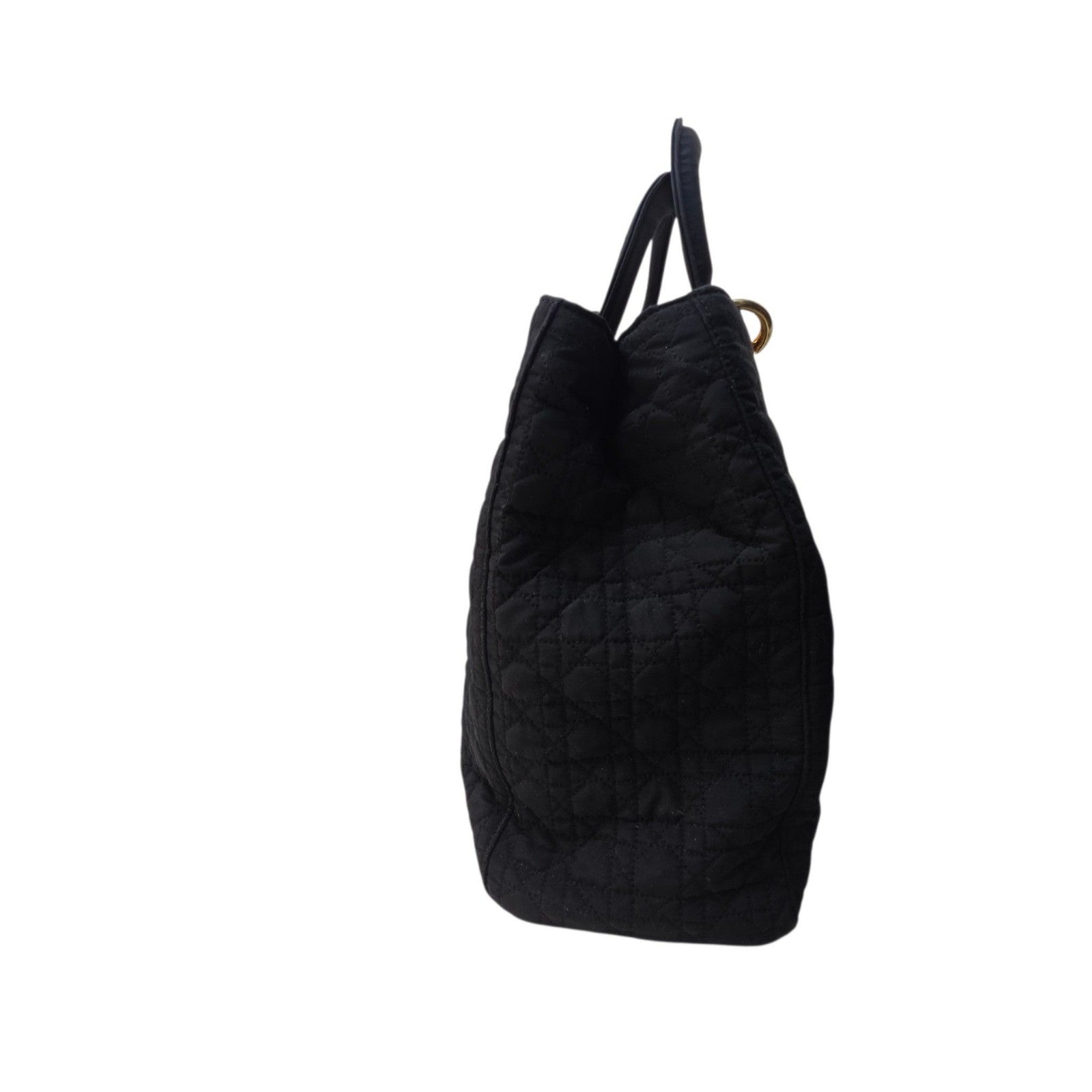 Christian Dior black quilted nylon tote bag with gold hardware and leather trim.
