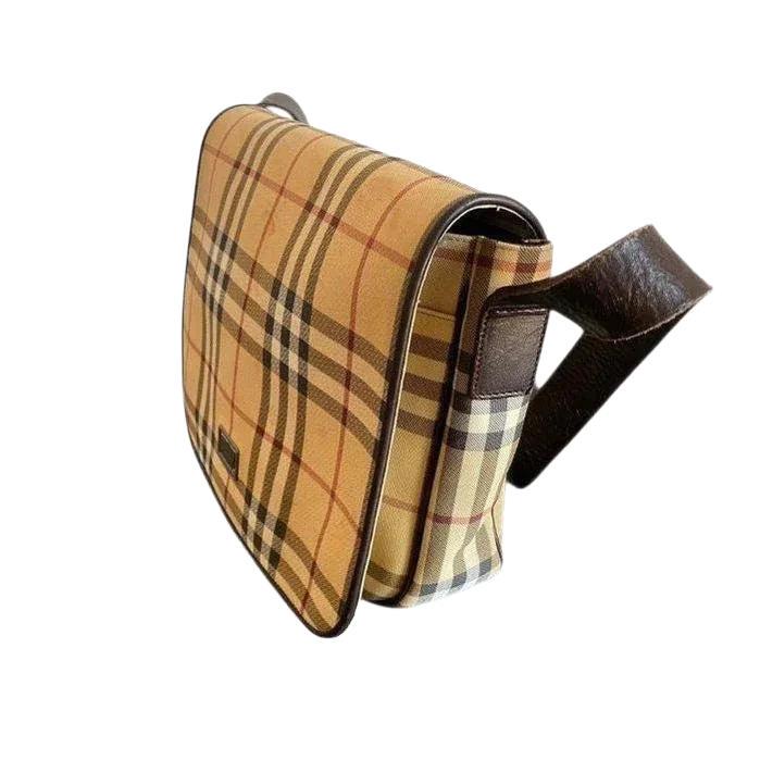 Burberry beige tote bag with iconic Nova Check pattern and leather accents.