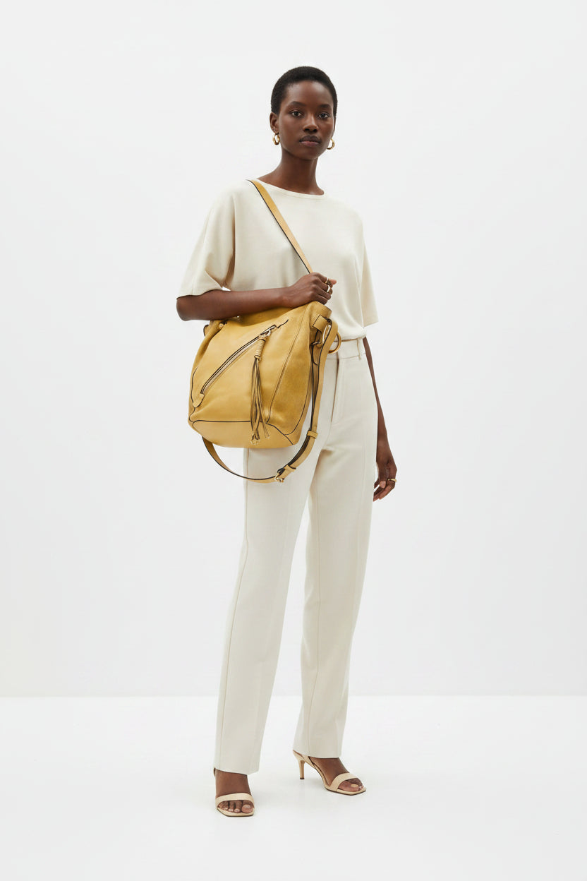 Chloè yellow suede and leather shoulder bag with gold-plated hardware and two-way design.