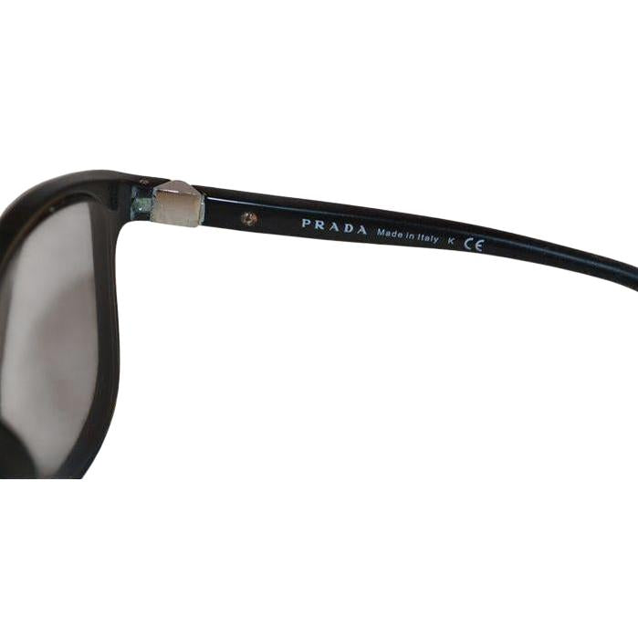 Prada black sunglasses with sleek frames, metal and plastic blend, minimalistic design.
