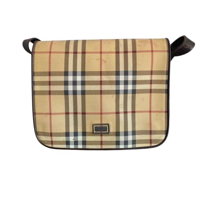 Burberry beige tote bag with iconic Nova Check pattern and leather accents.