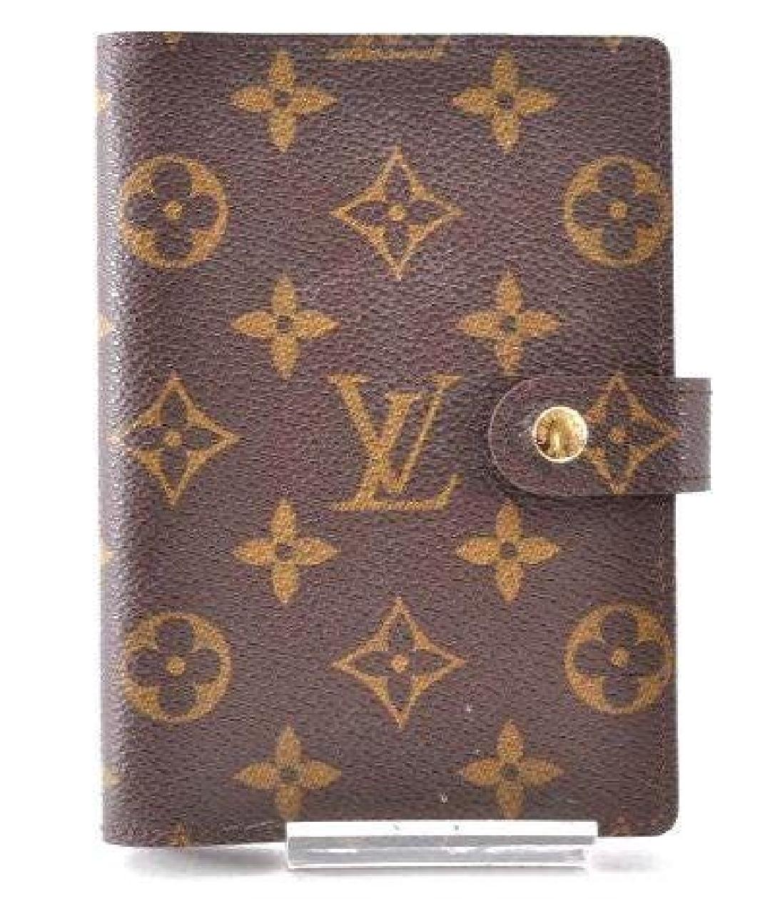 Louis Vuitton planner cover brown monogram coated canvas with gold tone hardware.