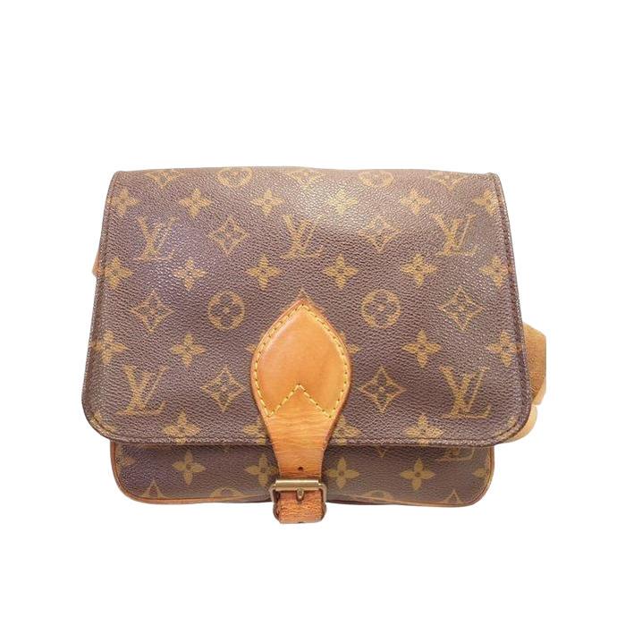 Louis Vuitton brown crossbody bag with iconic monogram canvas and aged leather trim.