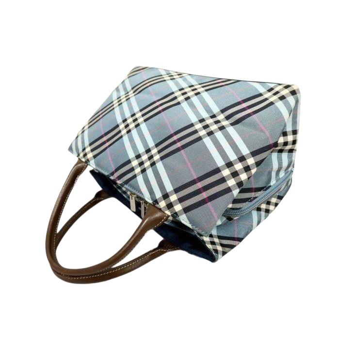 Burberry beige handbag featuring Nova Check pattern and smooth calf leather accents.