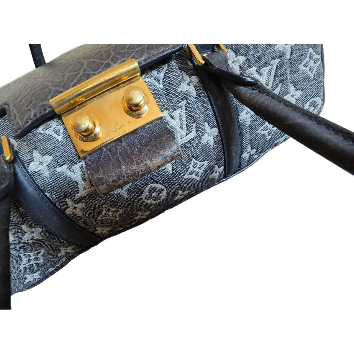 Louis Vuitton gold and grey handbag with monogram canvas and gold-plated accents.