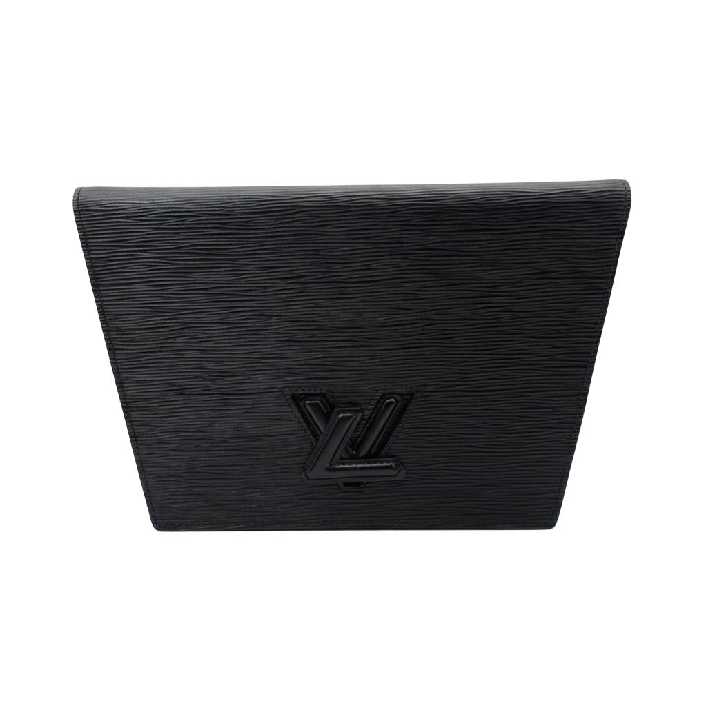 Louis Vuitton Epi Trapeze Clutch black leather with silver-plated hardware and subtle creasing.