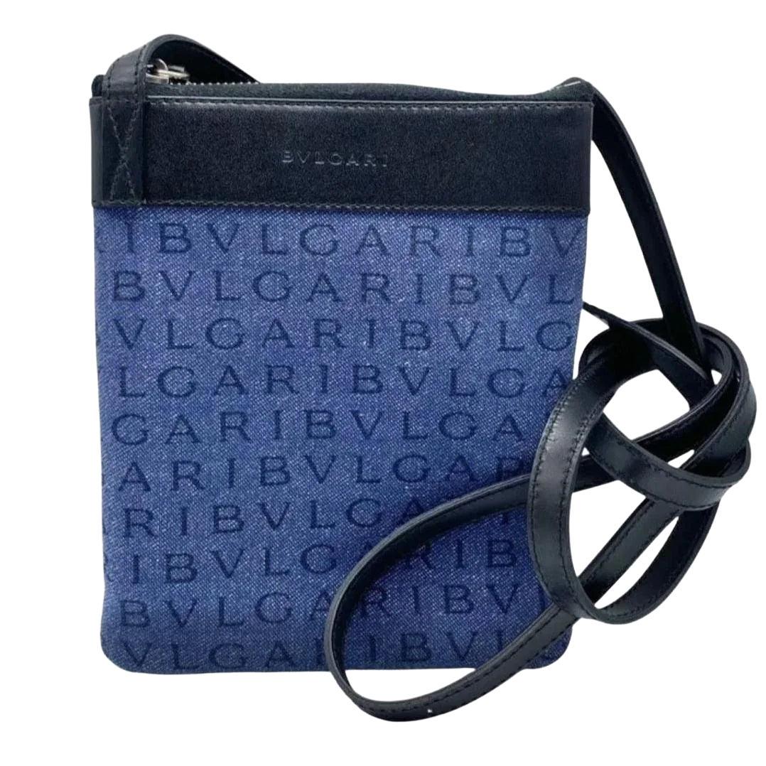 BVLGARI blue fanny pack with LogoMania print, leather trim, and silver hardware.