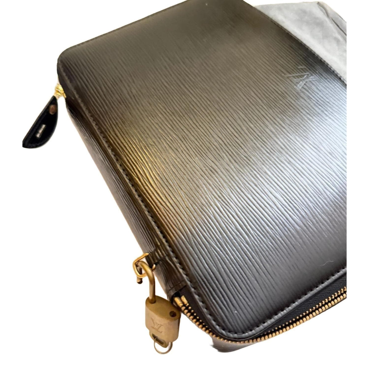 Louis Vuitton black Epi leather jewellery box with gold-tone hardware and grey microfiber lining.