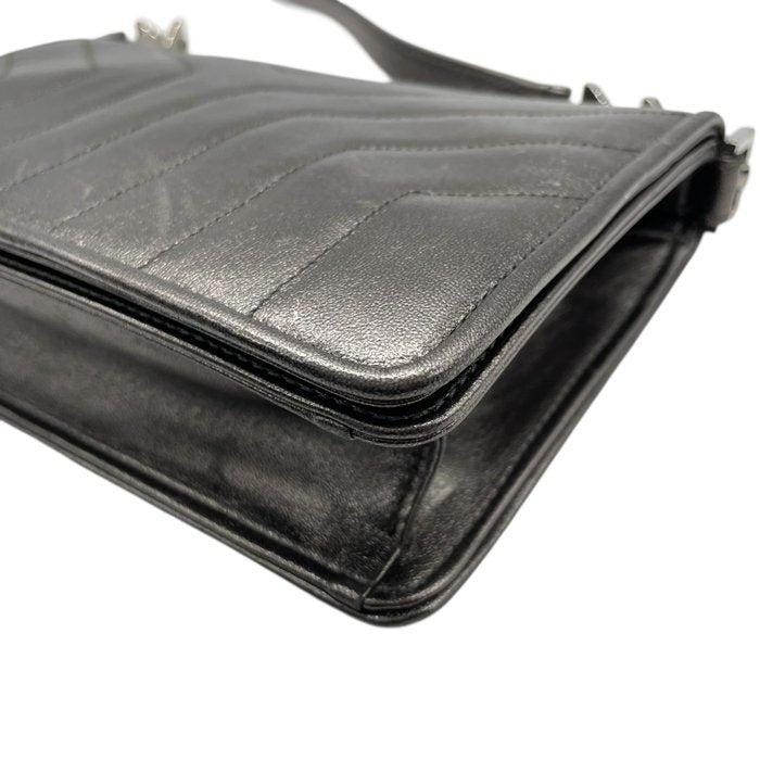 Yves Saint Laurent grey metallic shoulder bag with quilted design and silver tone hardware.