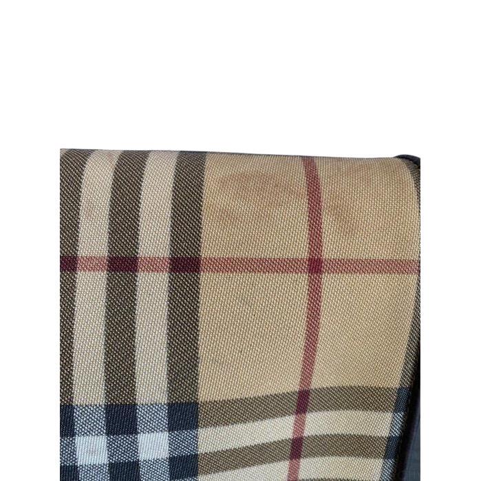 Burberry beige tote bag with iconic Nova Check pattern and leather accents.