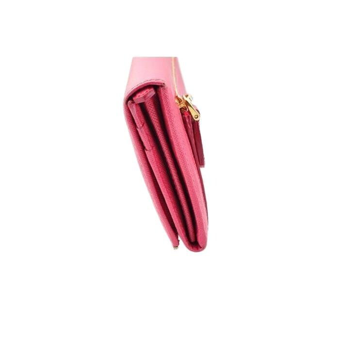 Prada pink leather wallet with logo detail and slim design, perfect for essentials.