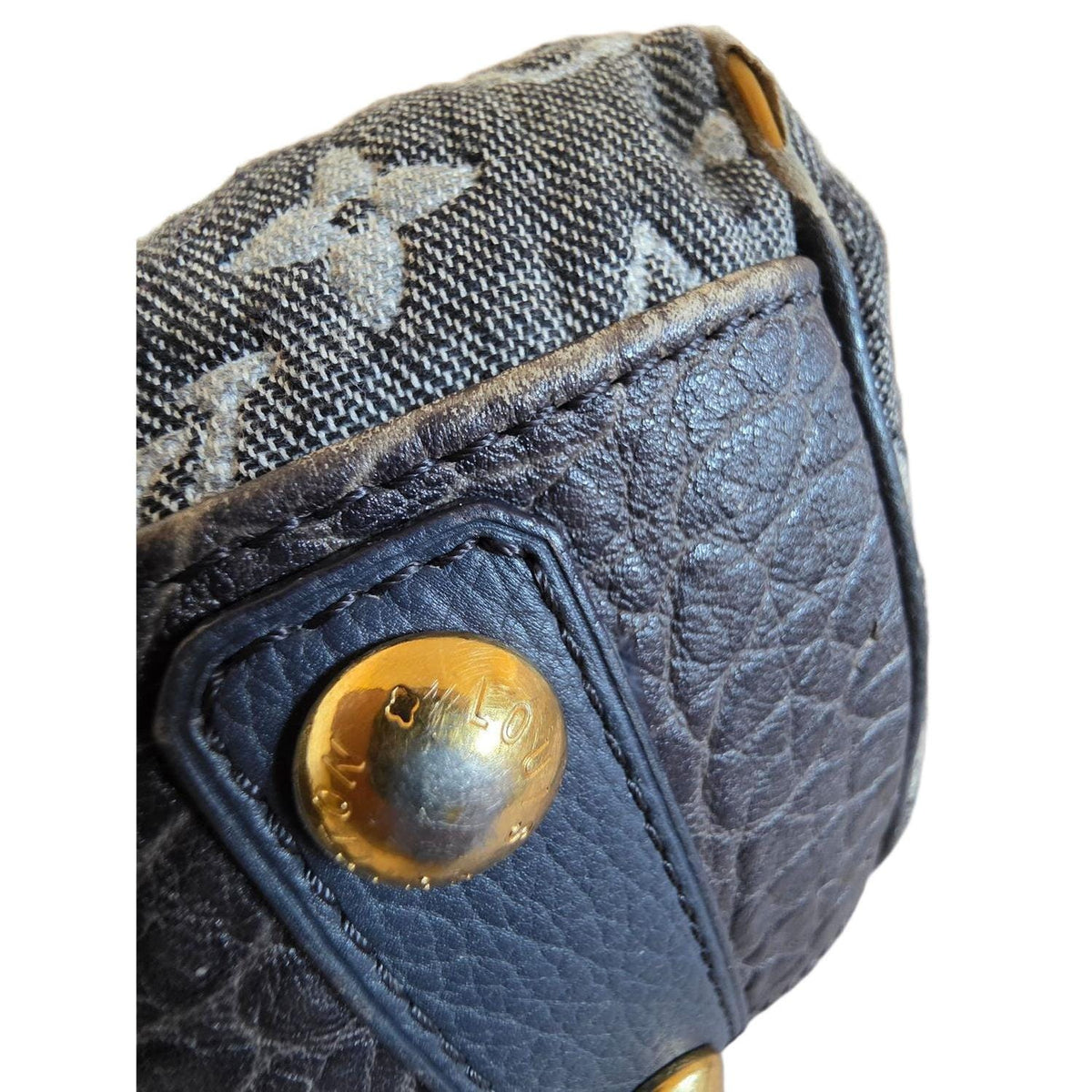 Louis Vuitton gold and grey handbag with monogram canvas and gold-plated accents.