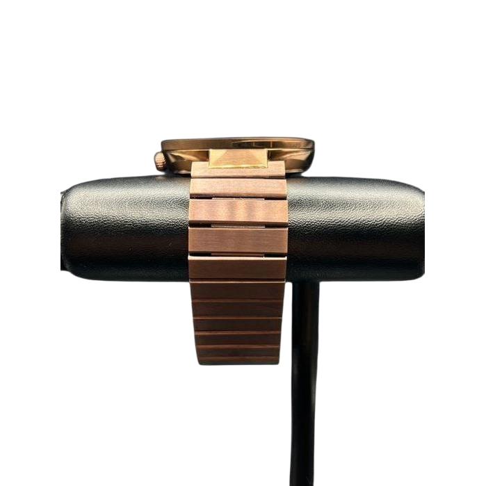 Gucci brown quartz watch with interlocking-G bezel and sunbrushed dial.