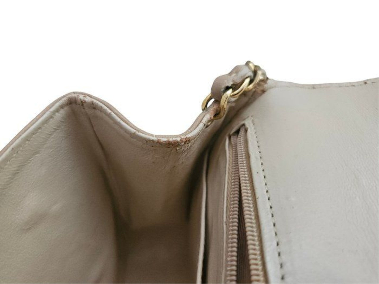 Chanel beige quilted leather flap bag with gold hardware and interlocking CC turn-lock.