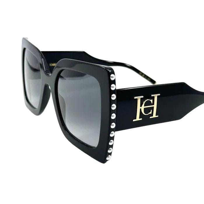 Carolina Herrera black acetate sunglasses with grey lenses and signature logo detailing.