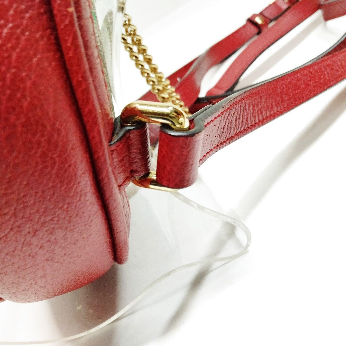 Gucci mini backpack gold GG monogram canvas with floral and butterfly print, interlocking logo.