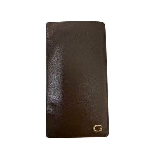 Gucci brown bifold wallet smooth leather with iconic logo and vintage craftsmanship.