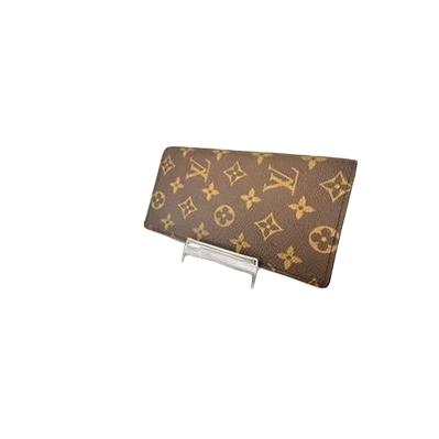 Louis Vuitton brown bifold wallet featuring iconic monogram pattern and coated canvas material.