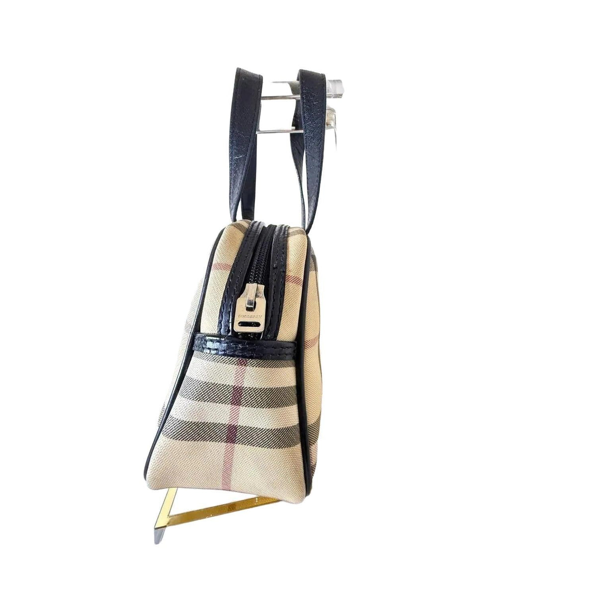 Burberry beige checkered top handle handbag with black leather trim and zipper closure.