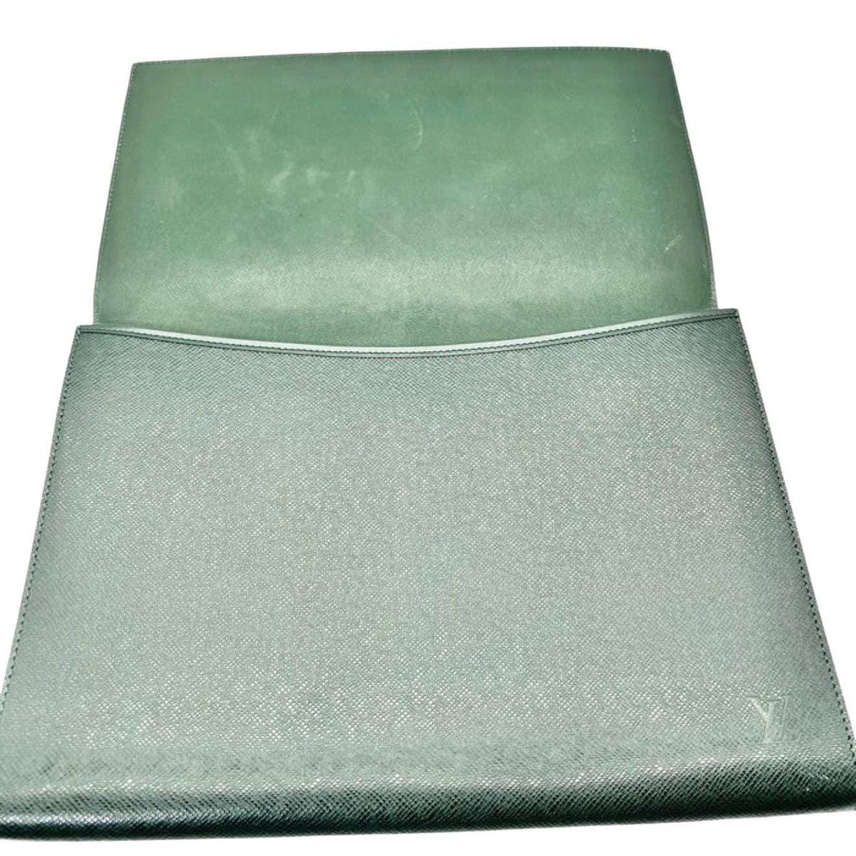 Louis Vuitton gold and green Volga clutch bag in Taiga leather with gold-tone hardware.
