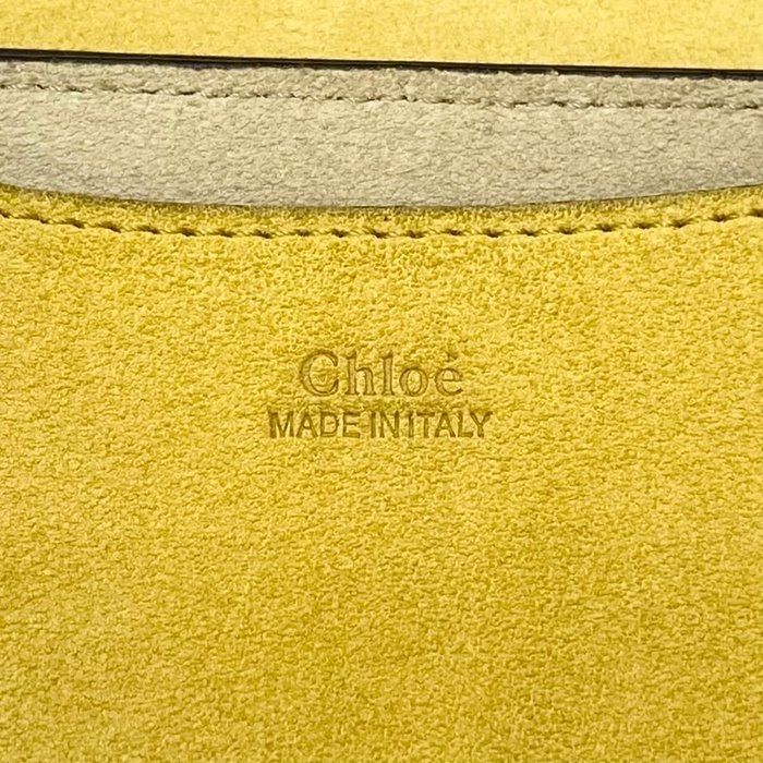 Chloè yellow suede messenger bag with gold-plated hardware and smooth leather accents.