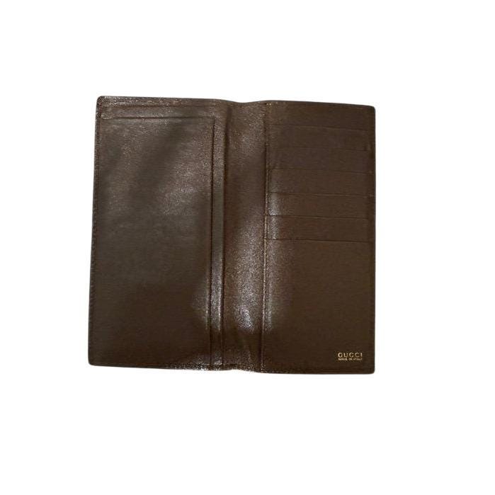 Gucci brown bifold wallet smooth leather with iconic logo and vintage craftsmanship.