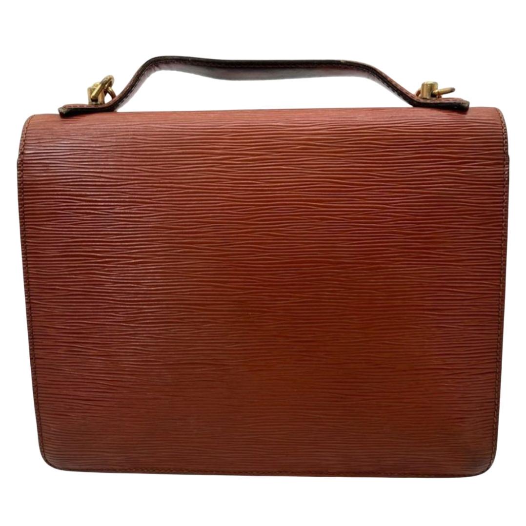 Louis Vuitton brown Monceau crossbody bag in Epi leather with S-lock closure and textured finish.