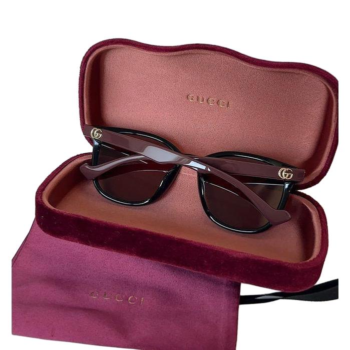 Gucci multicolour sunglasses with sleek frame and logo detail, excellent condition.