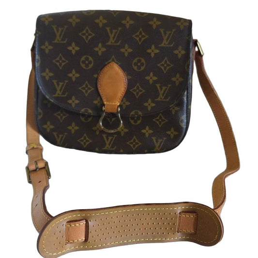 Louis Vuitton messenger bag gold monogram canvas with honey-hued Vachetta leather trim.