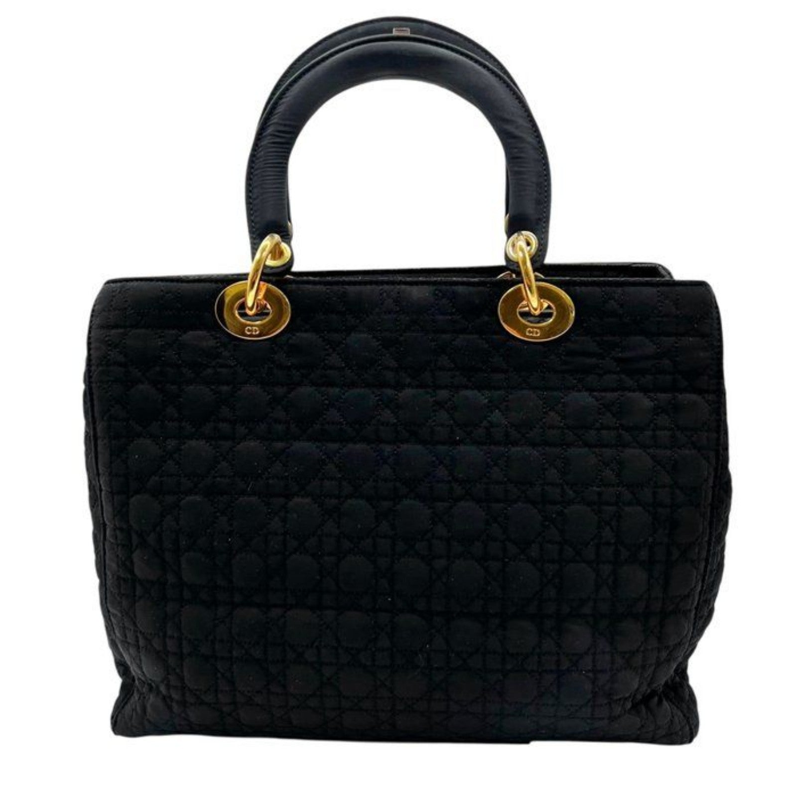 Christian Dior black quilted nylon tote bag with gold hardware and leather trim.