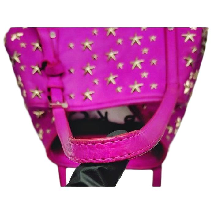 Jimmy Choo pink leather tote bag with metallic star studs and stainless steel hardware.