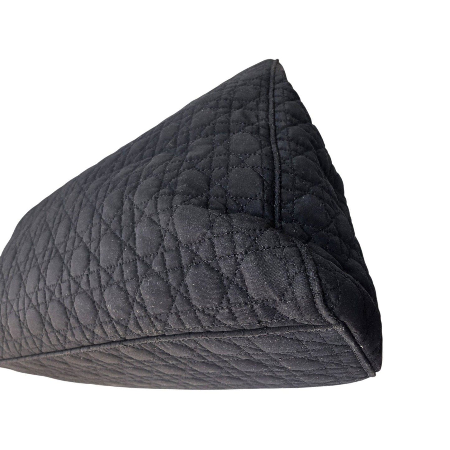 Christian Dior black quilted nylon tote bag with gold hardware and leather trim.