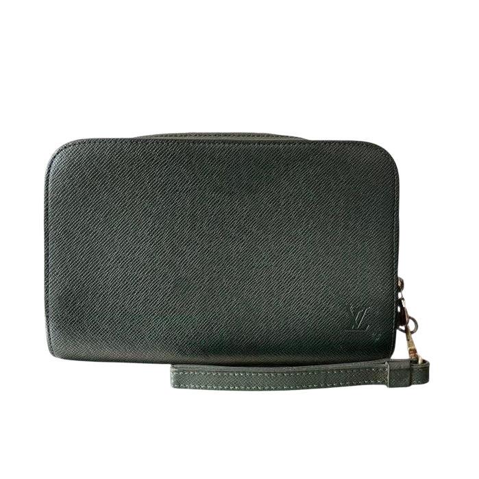 Louis Vuitton green Taiga leather pouch with red accents and textured finish.