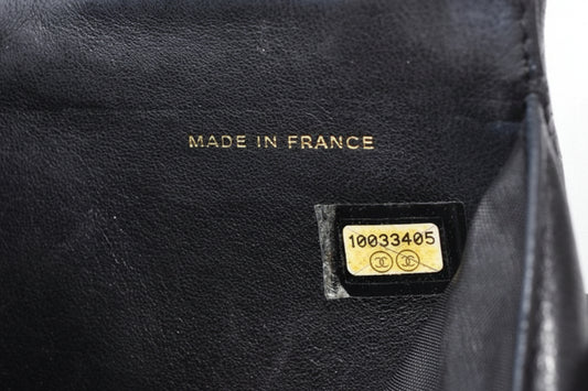Portefeuille Chanel en Cuir Caviar CC à Double Volet