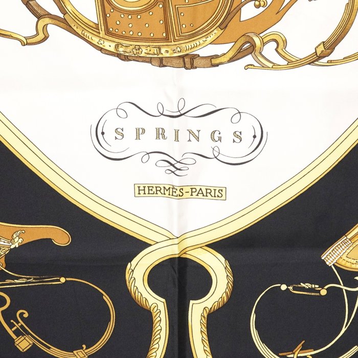 Hermès “Springs” Silk Carré Scarf 90 cm – Classic Equestrian Saddle Design